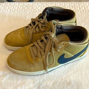 Nike low top lifestyle shoes, suede, tan with a navy swoosh